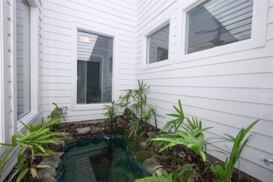 Beautiful Home with huge Sparkling Screened Pool with Private on Rio Pinar Golf and Country Club in Florida - for sale on GolfHomes.com, golf home, golf lot