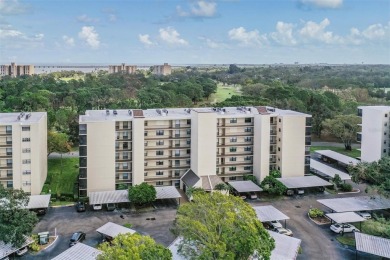 This spacious, light and bright fourth floor condo has a lovely on Cove Cay Country Club in Florida - for sale on GolfHomes.com, golf home, golf lot