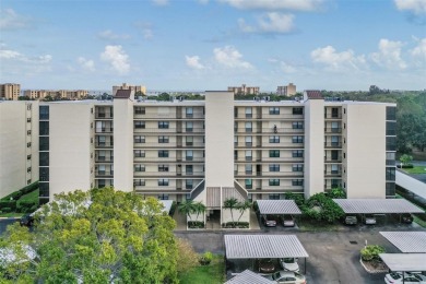 This spacious, light and bright fourth floor condo has a lovely on Cove Cay Country Club in Florida - for sale on GolfHomes.com, golf home, golf lot