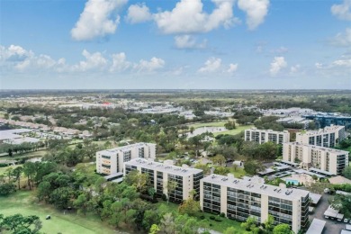 This spacious, light and bright fourth floor condo has a lovely on Cove Cay Country Club in Florida - for sale on GolfHomes.com, golf home, golf lot