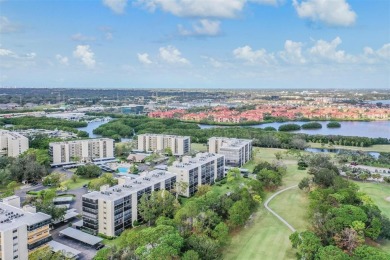 This spacious, light and bright fourth floor condo has a lovely on Cove Cay Country Club in Florida - for sale on GolfHomes.com, golf home, golf lot