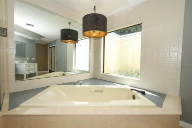 Beautiful Home with huge Sparkling Screened Pool with Private on Rio Pinar Golf and Country Club in Florida - for sale on GolfHomes.com, golf home, golf lot