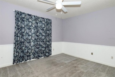 Beautiful Home with huge Sparkling Screened Pool with Private on Rio Pinar Golf and Country Club in Florida - for sale on GolfHomes.com, golf home, golf lot