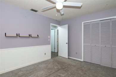 Beautiful Home with huge Sparkling Screened Pool with Private on Rio Pinar Golf and Country Club in Florida - for sale on GolfHomes.com, golf home, golf lot