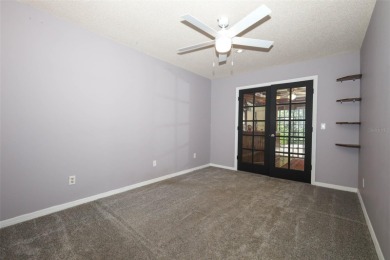 Beautiful Home with huge Sparkling Screened Pool with Private on Rio Pinar Golf and Country Club in Florida - for sale on GolfHomes.com, golf home, golf lot