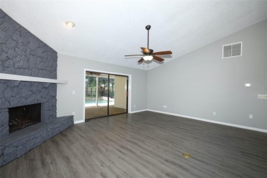 Beautiful Home with huge Sparkling Screened Pool with Private on Rio Pinar Golf and Country Club in Florida - for sale on GolfHomes.com, golf home, golf lot