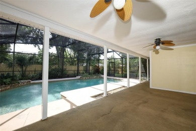Beautiful Home with huge Sparkling Screened Pool with Private on Rio Pinar Golf and Country Club in Florida - for sale on GolfHomes.com, golf home, golf lot