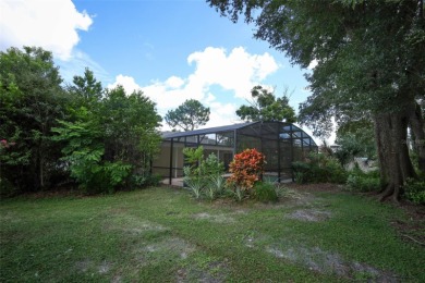 Beautiful Home with huge Sparkling Screened Pool with Private on Rio Pinar Golf and Country Club in Florida - for sale on GolfHomes.com, golf home, golf lot