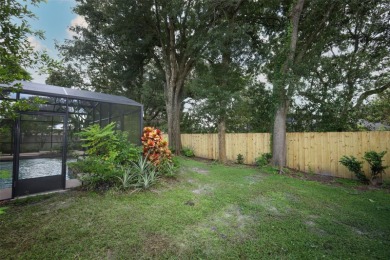 Beautiful Home with huge Sparkling Screened Pool with Private on Rio Pinar Golf and Country Club in Florida - for sale on GolfHomes.com, golf home, golf lot
