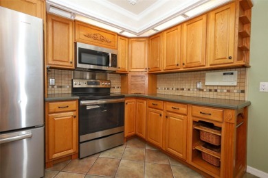 Beautiful Home with huge Sparkling Screened Pool with Private on Rio Pinar Golf and Country Club in Florida - for sale on GolfHomes.com, golf home, golf lot