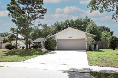 Beautiful Home with huge Sparkling Screened Pool with Private on Rio Pinar Golf and Country Club in Florida - for sale on GolfHomes.com, golf home, golf lot