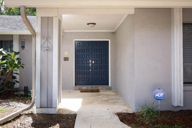 Beautiful Home with huge Sparkling Screened Pool with Private on Rio Pinar Golf and Country Club in Florida - for sale on GolfHomes.com, golf home, golf lot