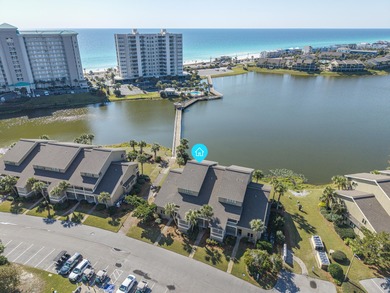 Beautiful 3-bedroom, 3-bath lakefront condo in the Boardwalk on Seascape Golf Course in Florida - for sale on GolfHomes.com, golf home, golf lot