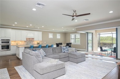 This amazing Pinnacle model home is stunning and ready for your on Panther Run Golf Club in Florida - for sale on GolfHomes.com, golf home, golf lot