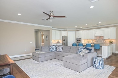 This amazing Pinnacle model home is stunning and ready for your on Panther Run Golf Club in Florida - for sale on GolfHomes.com, golf home, golf lot