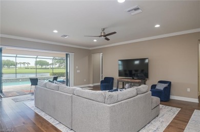 This amazing Pinnacle model home is stunning and ready for your on Panther Run Golf Club in Florida - for sale on GolfHomes.com, golf home, golf lot