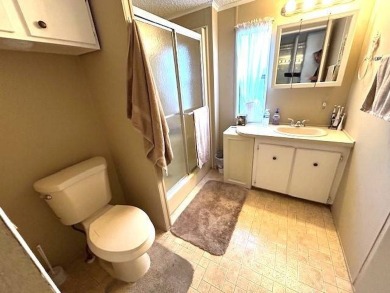 Discover this beautifully maintained 2-bedroom, 2-bathroom home on Crystal Lake Club in Florida - for sale on GolfHomes.com, golf home, golf lot