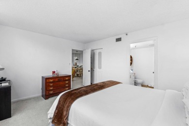 Charming 4th floor unit in elevator building. Wonderful Lake on Marina Lakes Golf Course in Florida - for sale on GolfHomes.com, golf home, golf lot