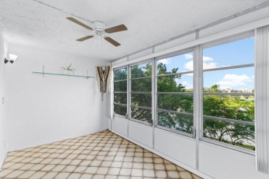 Charming 4th floor unit in elevator building. Wonderful Lake on Marina Lakes Golf Course in Florida - for sale on GolfHomes.com, golf home, golf lot