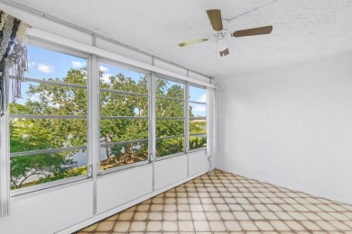 Charming 4th floor unit in elevator building. Wonderful Lake on Marina Lakes Golf Course in Florida - for sale on GolfHomes.com, golf home, golf lot