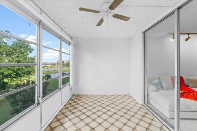 Charming 4th floor unit in elevator building. Wonderful Lake on Marina Lakes Golf Course in Florida - for sale on GolfHomes.com, golf home, golf lot