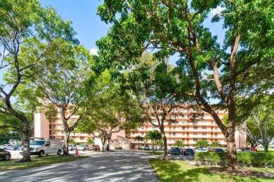 Charming 4th floor unit in elevator building. Wonderful Lake on Marina Lakes Golf Course in Florida - for sale on GolfHomes.com, golf home, golf lot