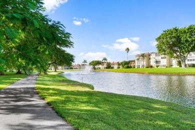 Charming 4th floor unit in elevator building. Wonderful Lake on Marina Lakes Golf Course in Florida - for sale on GolfHomes.com, golf home, golf lot