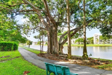 Charming 4th floor unit in elevator building. Wonderful Lake on Marina Lakes Golf Course in Florida - for sale on GolfHomes.com, golf home, golf lot