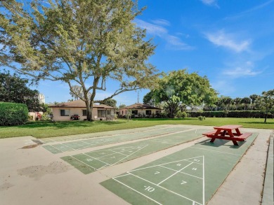 Charming 4th floor unit in elevator building. Wonderful Lake on Marina Lakes Golf Course in Florida - for sale on GolfHomes.com, golf home, golf lot