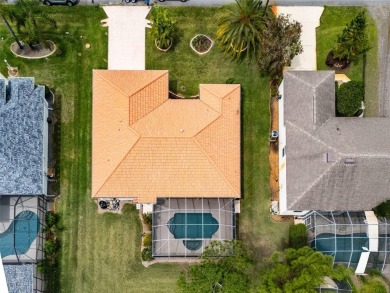 Here is what you have been looking for! A pool home in the on The Grand Club Cypress Course in Florida - for sale on GolfHomes.com, golf home, golf lot