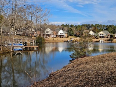 PRICED REDUCED BELOW APPRAISAL VALUE on this lovely WATERFRONT on Players Course At Wyboo Plantation in South Carolina - for sale on GolfHomes.com, golf home, golf lot