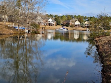 PRICED REDUCED BELOW APPRAISAL VALUE on this lovely WATERFRONT on Players Course At Wyboo Plantation in South Carolina - for sale on GolfHomes.com, golf home, golf lot