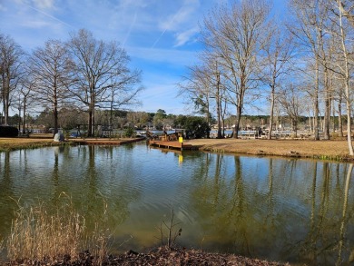 PRICED REDUCED BELOW APPRAISAL VALUE on this lovely WATERFRONT on Players Course At Wyboo Plantation in South Carolina - for sale on GolfHomes.com, golf home, golf lot