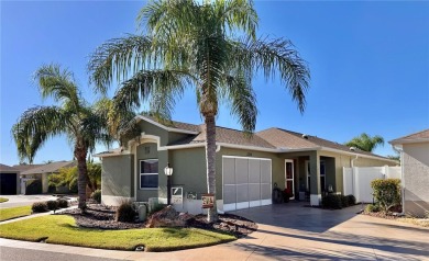 This three bedroom and two bath Anaheim courtyard villa will on Yankee Clipper Executive Golf Course in Florida - for sale on GolfHomes.com, golf home, golf lot