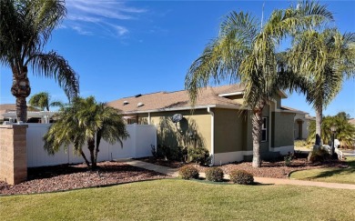 This three bedroom and two bath Anaheim courtyard villa will on Yankee Clipper Executive Golf Course in Florida - for sale on GolfHomes.com, golf home, golf lot