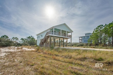 This Gold Fortified beach home, built in 2023, is just a short on Kiva Dunes Golf Club in Alabama - for sale on GolfHomes.com, golf home, golf lot