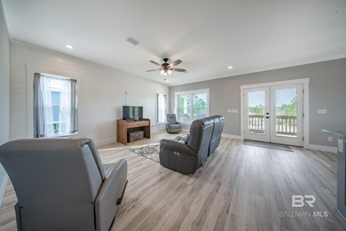 This Gold Fortified beach home, built in 2023, is just a short on Kiva Dunes Golf Club in Alabama - for sale on GolfHomes.com, golf home, golf lot