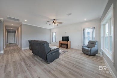 This Gold Fortified beach home, built in 2023, is just a short on Kiva Dunes Golf Club in Alabama - for sale on GolfHomes.com, golf home, golf lot