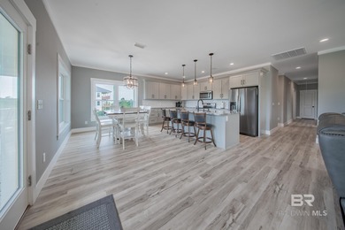 This Gold Fortified beach home, built in 2023, is just a short on Kiva Dunes Golf Club in Alabama - for sale on GolfHomes.com, golf home, golf lot