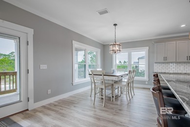 This Gold Fortified beach home, built in 2023, is just a short on Kiva Dunes Golf Club in Alabama - for sale on GolfHomes.com, golf home, golf lot