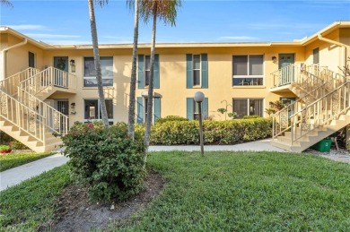 Discover this beautiful move-in-ready first-floor end unit in on The Glades Golf and Country Club in Florida - for sale on GolfHomes.com, golf home, golf lot