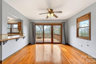 Located just moments from downtown Black Mountain, this on Black Mountain Golf Course in North Carolina - for sale on GolfHomes.com, golf home, golf lot