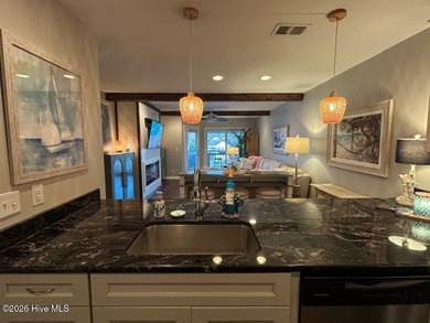 Spectacular intercoastal and golf course views from this on Brick Landing Plantation Yacht and Golf Club in North Carolina - for sale on GolfHomes.com, golf home, golf lot