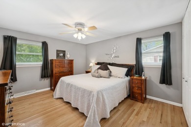 This beautifully updated home with its open floor plan, hardwood on Twin Lakes Golf Course in Illinois - for sale on GolfHomes.com, golf home, golf lot