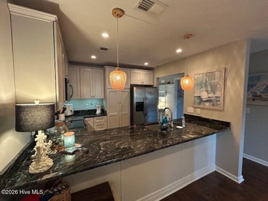 Spectacular intercoastal and golf course views from this on Brick Landing Plantation Yacht and Golf Club in North Carolina - for sale on GolfHomes.com, golf home, golf lot