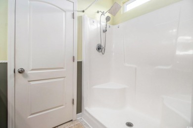 This beautifully maintained 3-bedroom, 2-bath home is located in on Long Bay Club in South Carolina - for sale on GolfHomes.com, golf home, golf lot