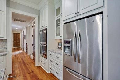 Located on a quiet cul-de-sac, this beautifully maintained on Reunion Golf Club in Mississippi - for sale on GolfHomes.com, golf home, golf lot
