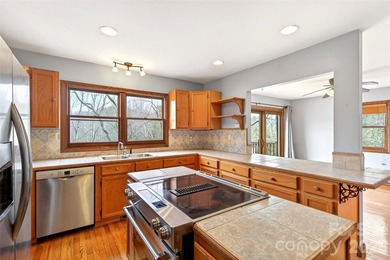 Located just moments from downtown Black Mountain, this on Black Mountain Golf Course in North Carolina - for sale on GolfHomes.com, golf home, golf lot