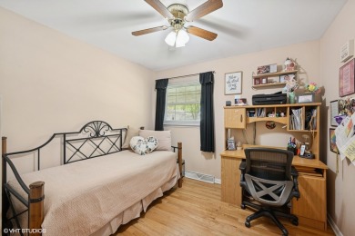 This beautifully updated home with its open floor plan, hardwood on Twin Lakes Golf Course in Illinois - for sale on GolfHomes.com, golf home, golf lot