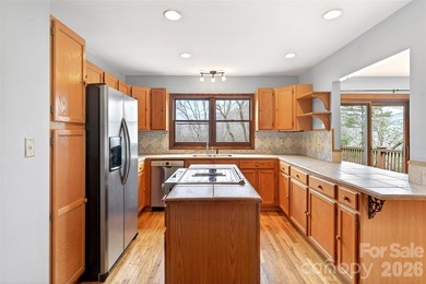 Located just moments from downtown Black Mountain, this on Black Mountain Golf Course in North Carolina - for sale on GolfHomes.com, golf home, golf lot